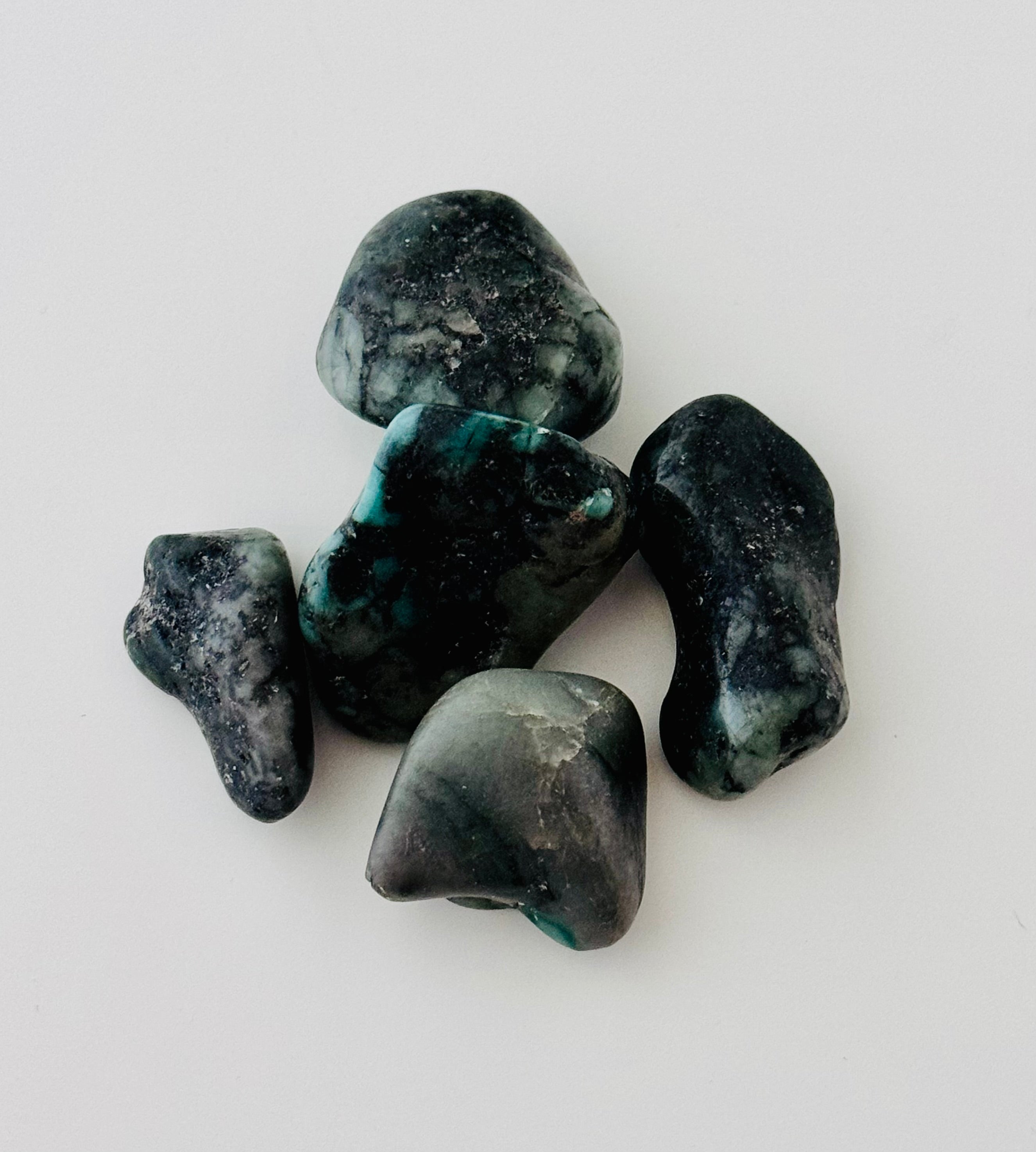 Emerald in matrix tumbles